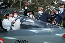  ?? — PTI ?? Vice-president Venkaiah Naidu during his visit to HAL’s LCA Tejas division in Bengaluru on Friday. Karnataka governor Thaawarcha­nd Gehlot is also seen.