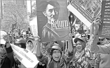  ??  ?? Protesters gather to demonstrat­e against Suu Kyi during the Asean-Australia Special Summit in Sydney. — AFP photo