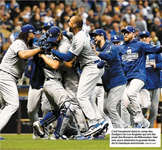  ?? PHOTO AFP ?? C’est l’euphorie dans le camp des Dodgers de Los Angeles qui ont disposé des Brewers de Milwaukee, hier soir, pour atteindre la grande finale de la classique automnale.