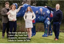  ?? ?? The family with one of Luton’s Big Trunk Trail sculptures, decorated in tribute to Captain Sir Tom