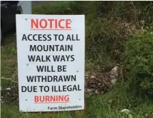  ??  ?? One of the signs erected by farmers at Crossboy crossroads.