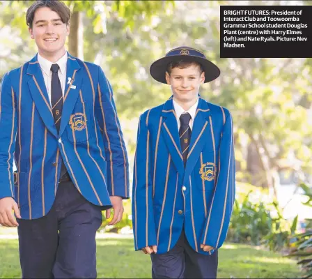  ?? Picture: Nev Madsen. ?? BRIGHT FUTURES: President of Interact Club and Toowoomba Grammar School student Douglas Plant (centre) with Harry Elmes (left) and Nate Ryals.