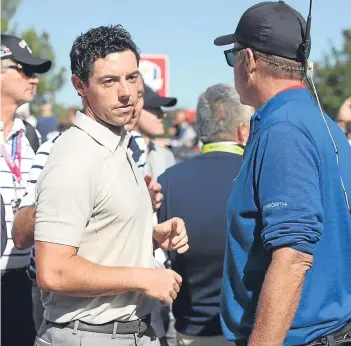  ?? Pictures: PA. ?? Left: Lee Westwood paid the price for missing a series of short putts in the closing stretch. Right: Rory McIlory came in for verbal abuse from a spectator.