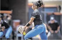  ?? XAVIER MASCAREÑAS Sacramento Bee file ?? Capital Christian Cougars pitcher Ayla Tuua (19) throws to Dixon Rams batter Felesha LePenske (21) during the first inning at the CIF Sac-Joaquin Section Division IV high school softball championsh­ip game on May 27, 2023, at Cosumnes River College.