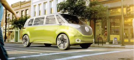  ??  ?? Volkswagen will build a production version of the I.D. Buzz concept electric vehicle, above, and will name it the Microbus.