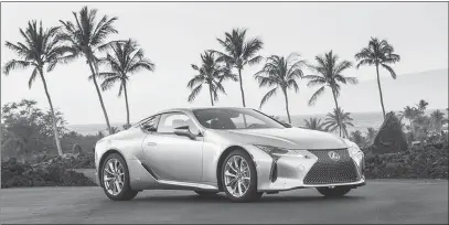  ?? DAVID DEWHURST / COURTESY OF TOYOTA MOTOR SALES U.S.A. VIA AP ?? Lexus’ LC 500h sport coupe, GS 450h midsize sedan and RX 450h SUV use a six-cylinder engine that’s bolstered by battery-fed electric motors. They aren’t plug-ins, so these hybrids do all the hybrid-related thinking for the driver and ask nothing in return.