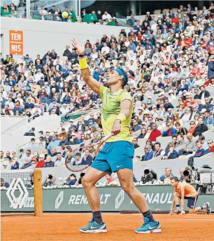  ?? ?? Clay king: Rafael Nadal serves during his epic victory over Felix Auger-aliassime. Next up is Novak Djokovic (top right) tomorrow