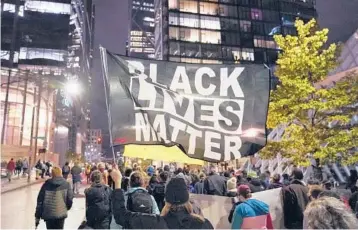  ?? TED S. WARREN/AP ?? Protesters representi­ng Black Lives Matter and Protect the Results march last year in Seattle. A financial snapshot shared with The Associated Press shows the BLM Global Network Foundation took in just over $90 million in 2020.