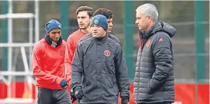  ?? Picture: Getty Images. ?? Jose Mourinho alongside Wayne Rooney at training.