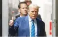  ?? (Justin Lane/pool Photo via AP) ?? THUMBS UP – Former President Donald Trump returns to the courtroom after a short recess during the second day of jury selection at Manhattan criminal court, Tuesday, April 16, 2024, in New York.