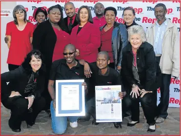  ?? Picture: FANIE FOURIE ?? PROUD: The staff of The Rep, back from left, Pat Roux (accounts), sales rep Mavis Buhe, Dieter Kleinsmith of classified sales, reporter Tembile Sgqolana, graphic designer Kirsti Schaefer, handyman Julius Mapempeni, middle from left, receptioni­st Penelope Mzamo, advertisin­g head Charodine Visagie, general assistant Nokuzola Lusithi and front from left, editor Sonja Raasch, senior reporter Zolile Menzelwa, reporter Loyiso Dyongman and sub-editor Chux Fourie
