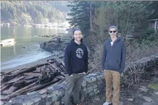  ??  ?? Ethan Kennedy, left, and Tyler Salt of North Vancouver explore Tyee Point at Horseshoe Bay.