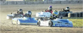  ?? BOB TYMCZYSZYN/POSTMEDIA NEWS ?? BobCat of Hamilton kart racing series at Merrittvil­le Speedway in Thorold on Tuesday night.