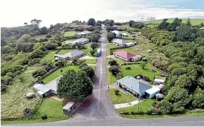  ??  ?? Why settle for one house when you could have 10? This entire street of houses in Cape Foulwind, Westport, has come onto the market.