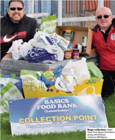  ??  ?? Huge collection David Shaw from Basics Food Bank along with Wishaw chairman Bill Kilgour