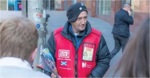  ??  ?? Big Issue vendor Paul Kelly was known for his ‘ don’t be shy, give it a try’ catchphras­e