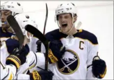  ?? GENE J. PUSKAR — THE ASSOCIATED PRESS FILE ?? The Sabres’ Jack Eichel celebrates his game-winning overtime goal during a game against the Penguins in Pittsburgh.