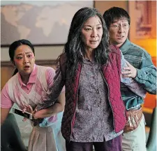  ?? ALLYSON RIGGS/A24 TNS ?? From left, Stephanie Hsu, Michelle Yeoh and Ke Huy Quan in "Everything Everywhere All at Once."