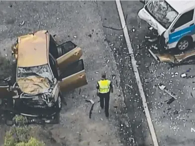  ?? Picture: CHANNEL 7 NEWS ?? The mangled wreckage of a car and a van involved in an accident yesterday.