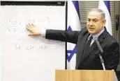 ?? SEBASTIAN SCHEINER AP ?? Israeli Prime Minister Benjamin Netanyahu explains the election results to his nationalis­t allies.
