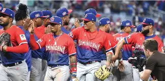  ?? FE ?? Manny Machado festeja con sus compañeros el triunfo ante Nicaragua la tarde de ayer.