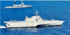  ?? AFP WESTERN COMMAND/AGENCE FRANCE-PRESSE ?? Side-by-side BRP Gregorio del Pilar (top) and USS Gabrielle Giffords hold joint patrol during a maritime cooperativ­e activity in the West Philippine Sea.