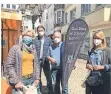  ?? FOTO: STADT ?? Fairtrade-Aktion auf dem Moerser Wochenmark­t.