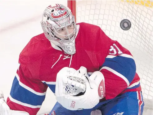  ?? RYAN REMIORZ / THE CANADIAN PRESS ?? Montreal Canadiens netminder Carey Price leads the rather impressive list of elite goaltender­s plying their trade for Canadian teams this season.