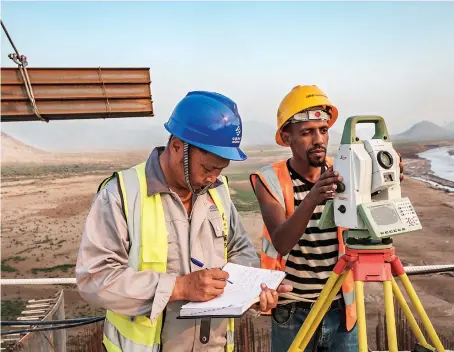  ?? File/AFP ?? Workers perform measuremen­ts at the Grand Ethiopian Renaissanc­e Dam in Ethiopia. Egypt, Sudan and Ethiopia are deadlocked in the dam dispute.