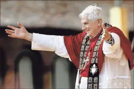  ?? Eidon Press/Zuma Press/TNS ?? Pope Benedict XVI waves to the faithful and pilgrims during a meeting with youths at the Santa Maria Degli Angeli Basilica in June 2007, in Assisi, Italy.