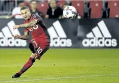  ?? NATHAN DENETTE/THE CANADIAN PRESS ?? Toronto FC forward Sebastian Giovinco is out with an injured quadriceps and may not return to the pitch until the middle of October.