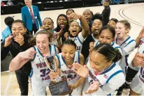  ?? BILLY SCHUERMAN/STAFF ?? Princess Anne players celebrate their victory over Salem for the Class 5 Region A championsh­ip at Scope on Monday.