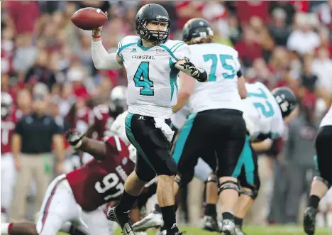  ?? GETTY IMAGES ?? Alex Ross is Coastal Carolina’s all-time leader in a host of passing categories, the first quarterbac­k selected to the All-Big South first team for three consecutiv­e seasons, and was 33-8 as a starter for the Chanticlee­rs. That’s not to mention the...