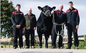  ?? Ref:RH16092202­0 ?? JAMES MACLVER, owner David Stubbs, Aberdeen-Angus bull, Logie President and Andrew Reid with son Andrew