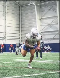  ?? Brendan Hill / UConn / Contribute­d photo ?? UConn receiver Keelan Marion participat­es in practice Thursday.