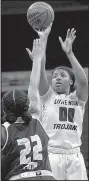  ?? Special to the Democrat Gazette/ JONATHAN BACHMAN ?? UALR forward Ronjanae DeGray (right) shoots over Texas State forward Ti’Aira Pitts during the first half Sunday.