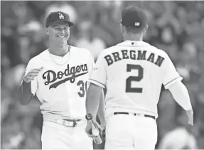  ?? CHARLES LECLAIRE/USA TODAY SPORTS ?? Joc Pederson, left, and Alex Bregman are two of the top talents developed by the Dodgers and Astros in recent years.