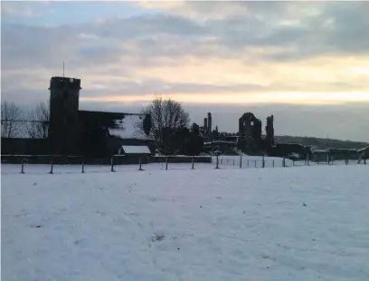  ??  ?? St Mary’s Church, Coity, and Coity Castle