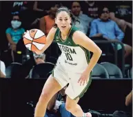  ?? Matt York / Associated Press ?? Former UConn great Sue Bird announced Friday that she will play in the upcoming WNBA season for Seattle. It will be her 19th season in the league.