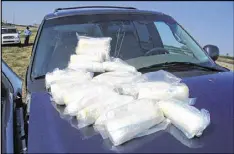  ?? CONTRIBUTE­D BY OKLAHOMA BUREAU OF NARCOTICS ?? About 20 pounds of Mexican crystal meth seized from a dealer by an Oklahoma narcotics agent.