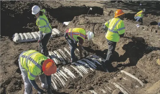  ?? CITY OF TULSA VIA AP ?? In this image provided by the City of Tulsa, Crews work on an excavation at Oaklawn Cemetery searching for victims of the 1921 Tulsa Race Massacre on Oct. 27 in Tulsa, Okla.