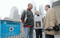  ?? KATHY WILLENS/ THE ASSOCIATED PRESS ?? New York Fire Department Chief Jim Riches, left, and Rosemary Cain, centre, parents of fi rst responders killed in the Sept. 11, 2001 terrorist attacks, talk to lawyer Norman Siegel near the National September 11 Memorial & Museum in New York. The...