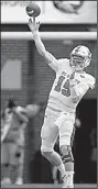  ?? AP/MARK WALLHEISER ?? N.C. State quarterbac­k Ryan Finley threw for 230 yards and two touchdowns Saturday to lead the Wolfpack over No. 12 Florida State.
