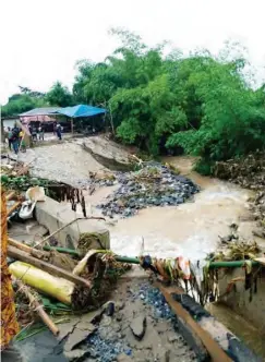  ??  ?? The collapsed Adigbe-Opako bridge before it was reconstruc­ted by the present government in 2019