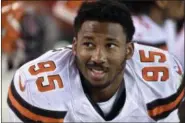  ?? ASSOCIATED PRESS FILE ?? Myles Garrett sits on the bench during the first half of a preseason game against the Saints in Cleveland.