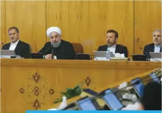  ?? —AFP ?? TEHRAN: Iranian President Hassan Rouhani attends a cabinet meeting yesterday.