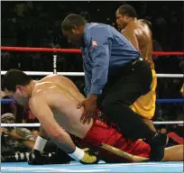  ??  ?? Fallen hero: Klitschko is felled by Lamon Brewster in 2004