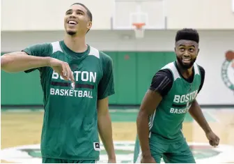  ?? HERALD FILE PHOTO BY JIM MICHAUD ?? TWO IMPRESSIVE: Rookie Jayson Tatum (left) and sophomore Jaylen Brown put up strong performanc­es for the Celtics summer league squad.