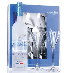  ?? COURTESY OF SAQ ?? The SAQ sells a variety of gift sets, including this one with Grey Goose vodka and a pair of glasses perfect for a couple of holiday cosmopolit­ans ($53).