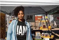  ?? ?? That’s My Jam owner MarQuita Pettis shows her stall at the West Oakland Farmers Market last week. Her business sells low-sugar jam blends at the market.